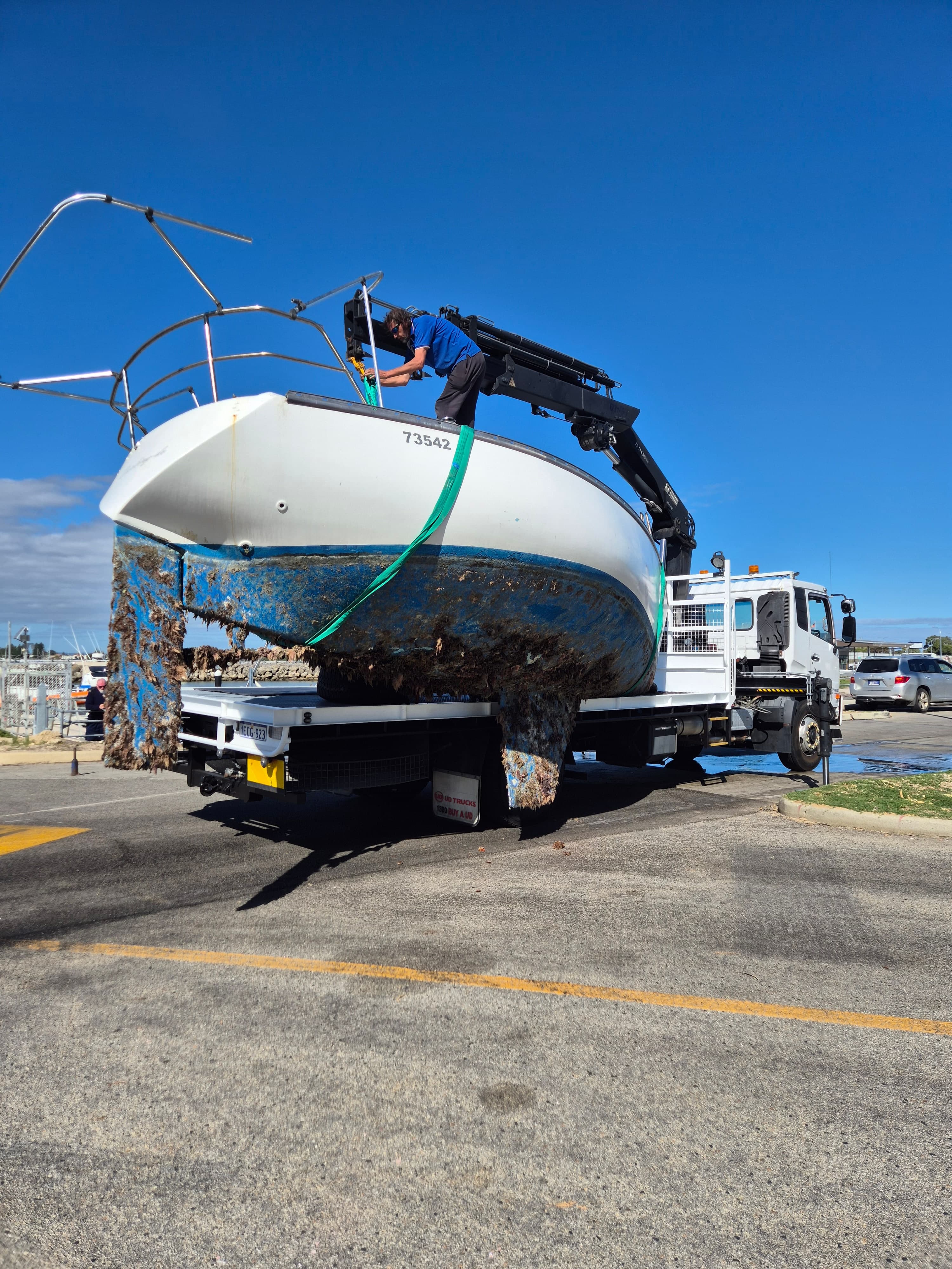 Susa Cranes HIAB — hauled out: off the cradle, onto the flatbed