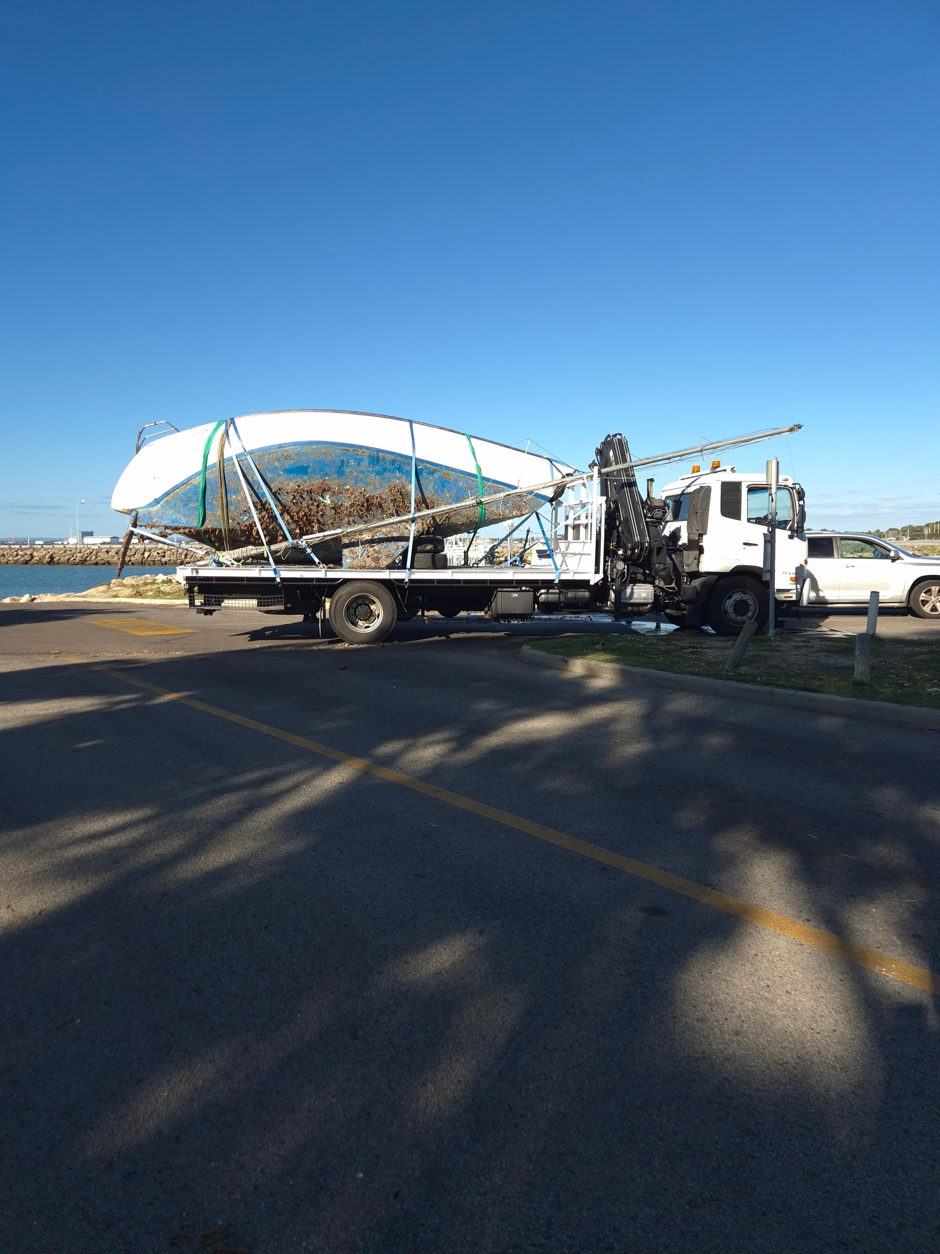 Susa Cranes HIAB — marina-side: ready for the road between berths